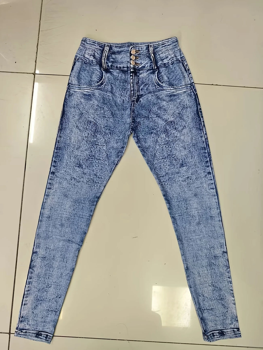 Looks Like Jeans. Feels Like Leggings. Ultra-Stretchy Printed Skinny Pants with Stylish Faux Pocket & Button Details.