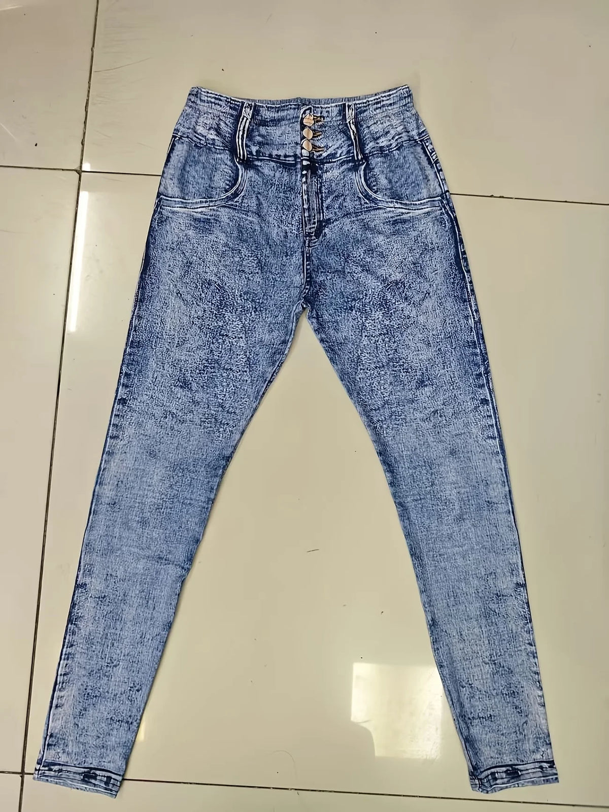 Looks Like Jeans. Feels Like Leggings. Ultra-Stretchy Printed Skinny Pants with Stylish Faux Pocket & Button Details.