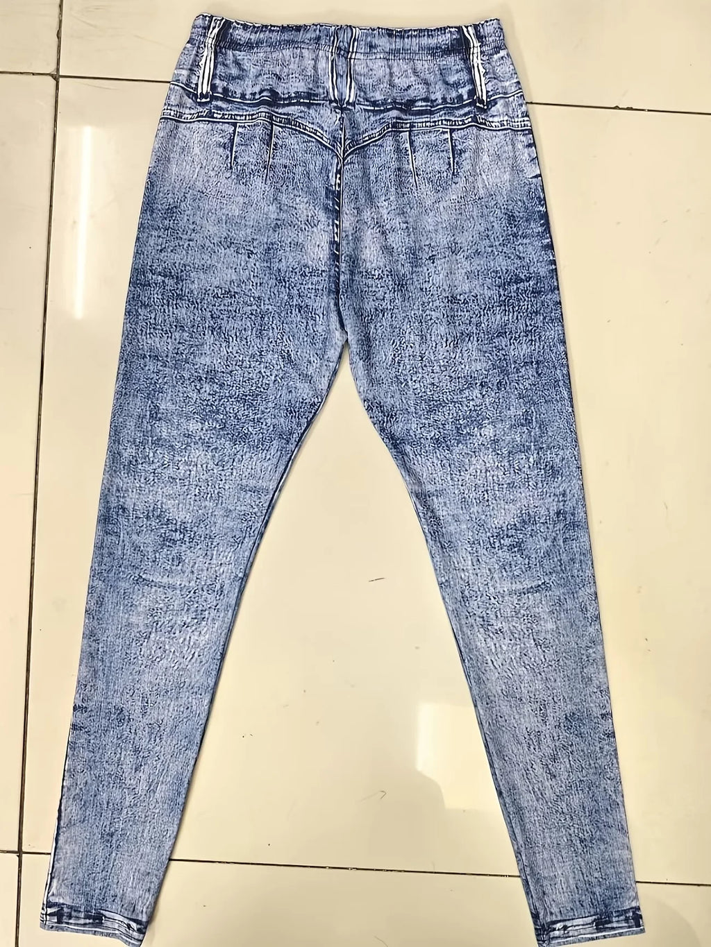 Looks Like Jeans. Feels Like Leggings. Ultra-Stretchy Printed Skinny Pants with Stylish Faux Pocket & Button Details.
